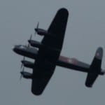A Lancaster flies over Tongham