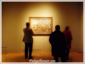 Visitors admire a painting at London's Courtauld Gallery