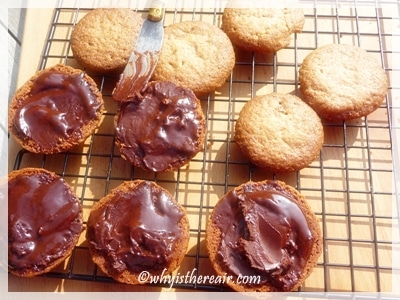 Fill half the biscuits with chocolate ganache
