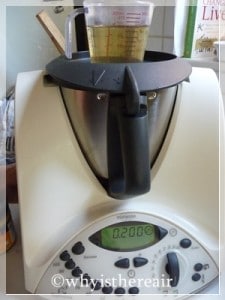 Weigh your oil into a jug set on top of the Thermomix bowl