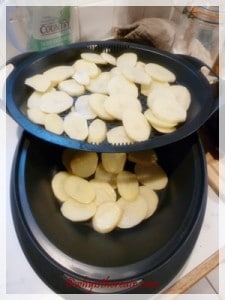 Potatoes slices to be steamed in the Varoma steamer