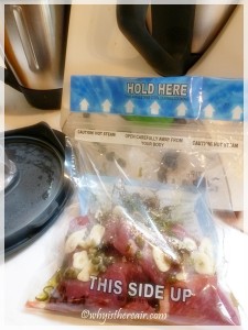 Place all the lamb ingredients into a bag, mix together by hand and seal the bag. I used Ziploc's Zip'n Steam microwave steaming bags to good effect